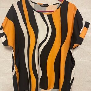 Black, yellow and white blouse